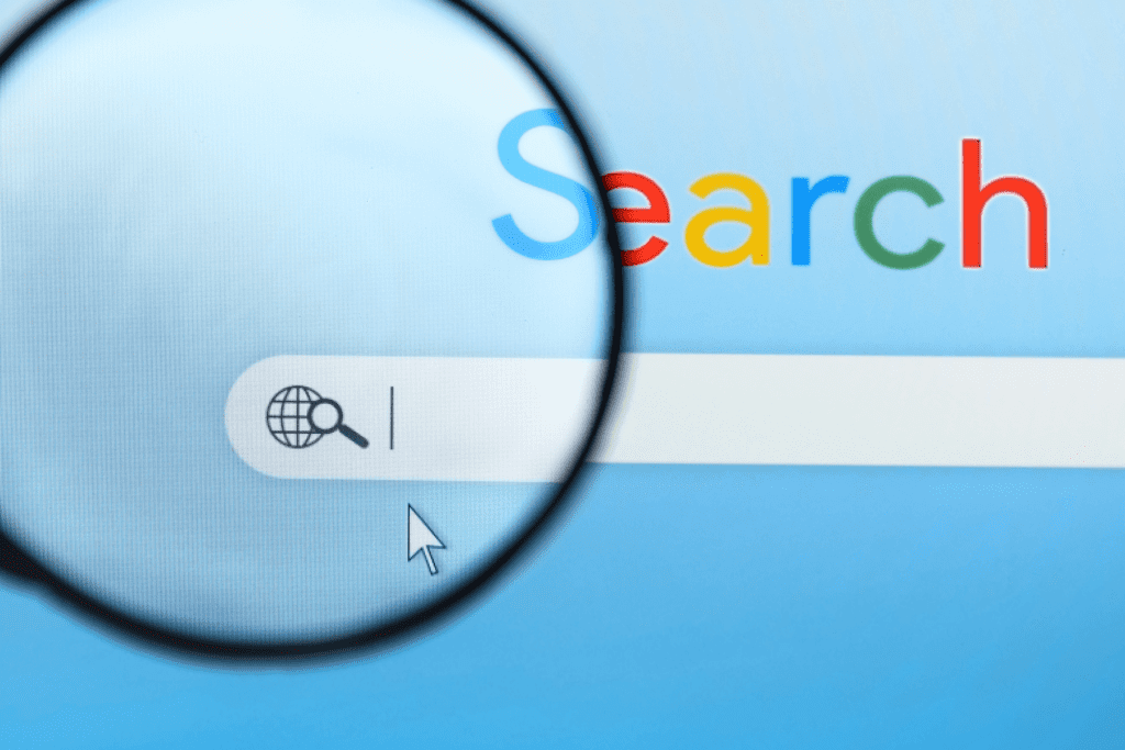 Magnifying glass over an online browser. Searching for the best private browsers.
