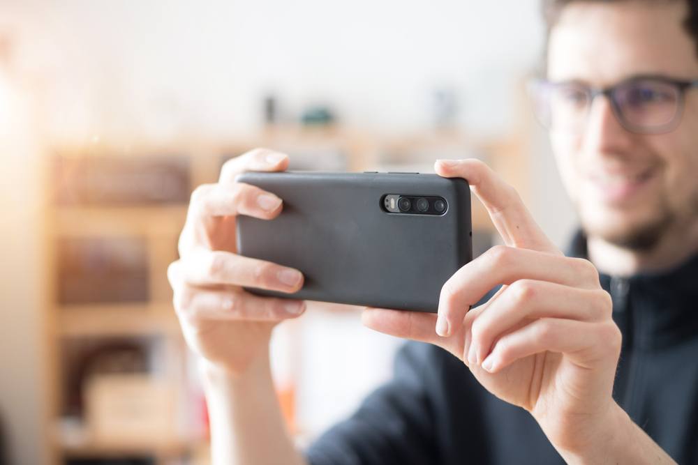 Man using snapchat