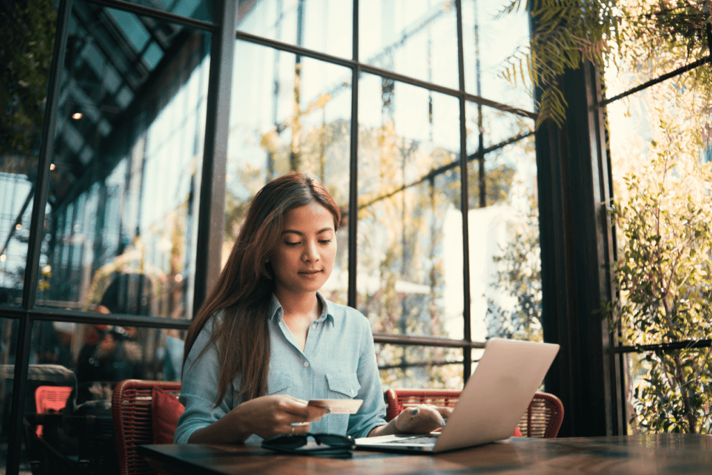 Woman shopping online avoiding paypal email scam