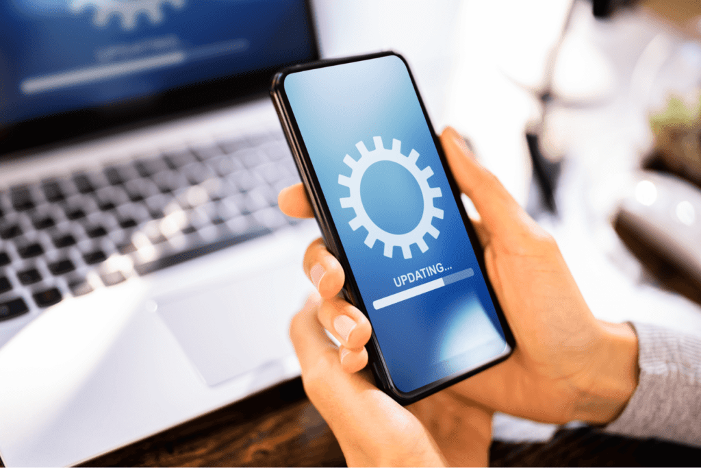 Person updating firmware on their smartphone