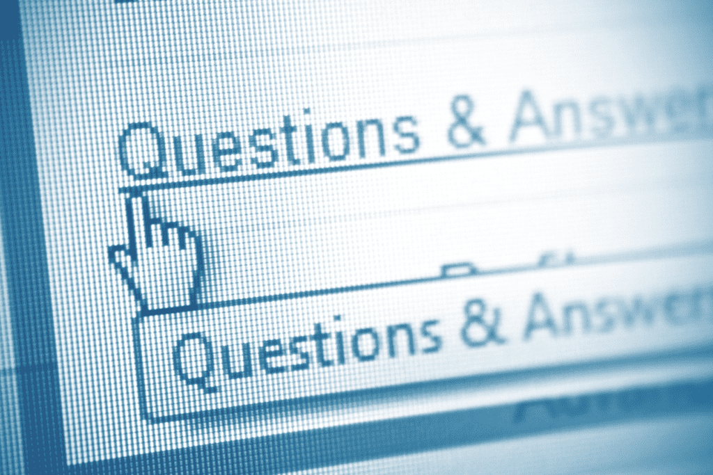 On a computer screen, a mouse cursor hovers over a link for security Question & Answers