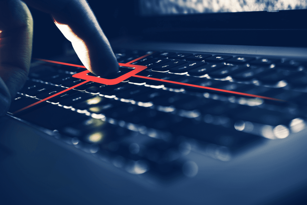 A keystroke logger visualized with a red highlight around a keyboard key tracking