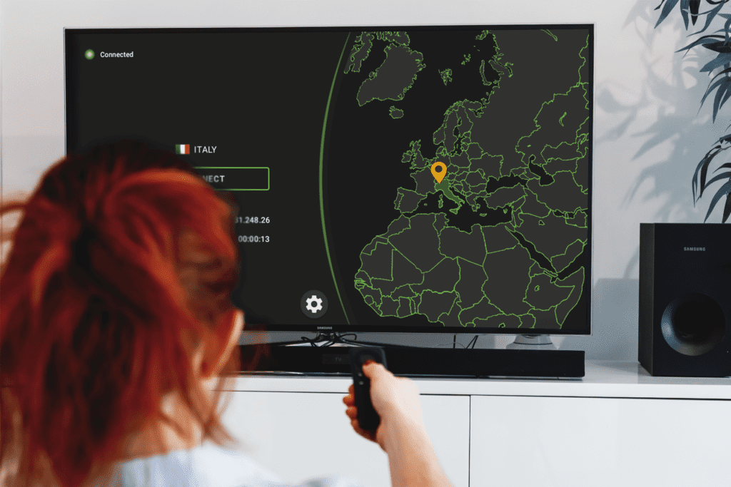 A person uses their Fire TV to navigate the newSilverBackVPNVPN app for Fire TV Stick