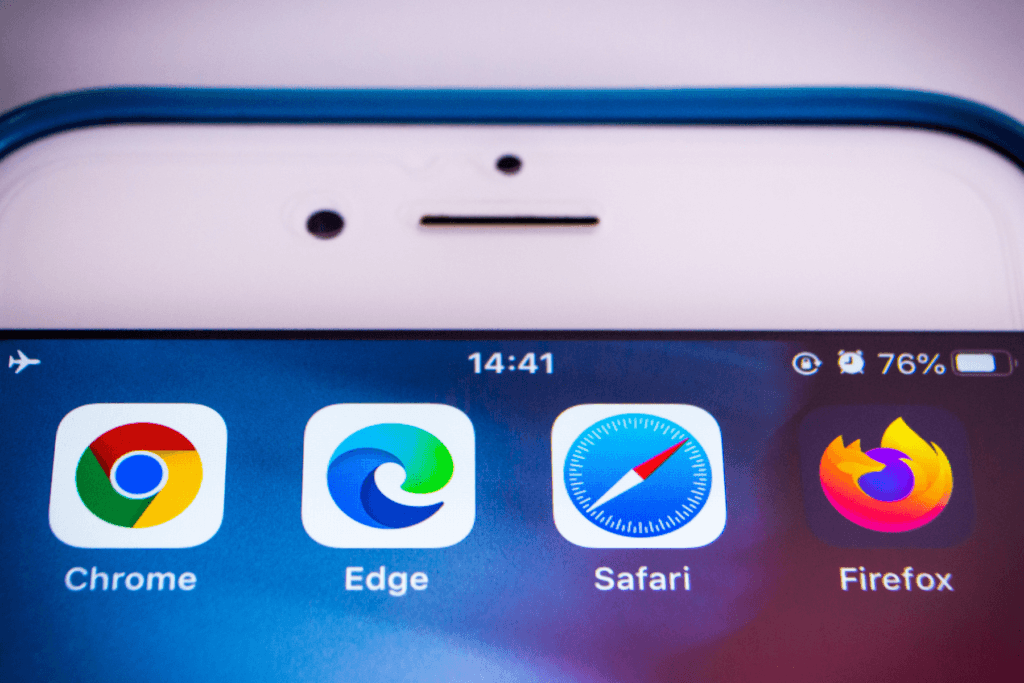 A phone displays multiple web browser icons include Chrome, Edge, Safari, and Firefox to help you determine the best web browser