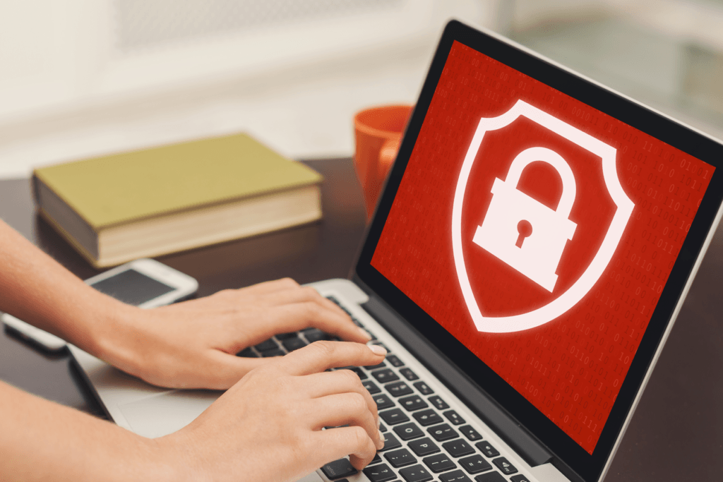A person at a laptop is blocked from accessing a website due to a security implementation; read to learn how to block a website