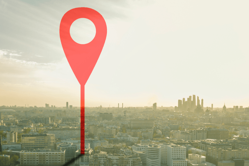 Decorative visualization of a location pin over a city skyline indicates location targeting; can VPN stop targeted ads? In some instances.