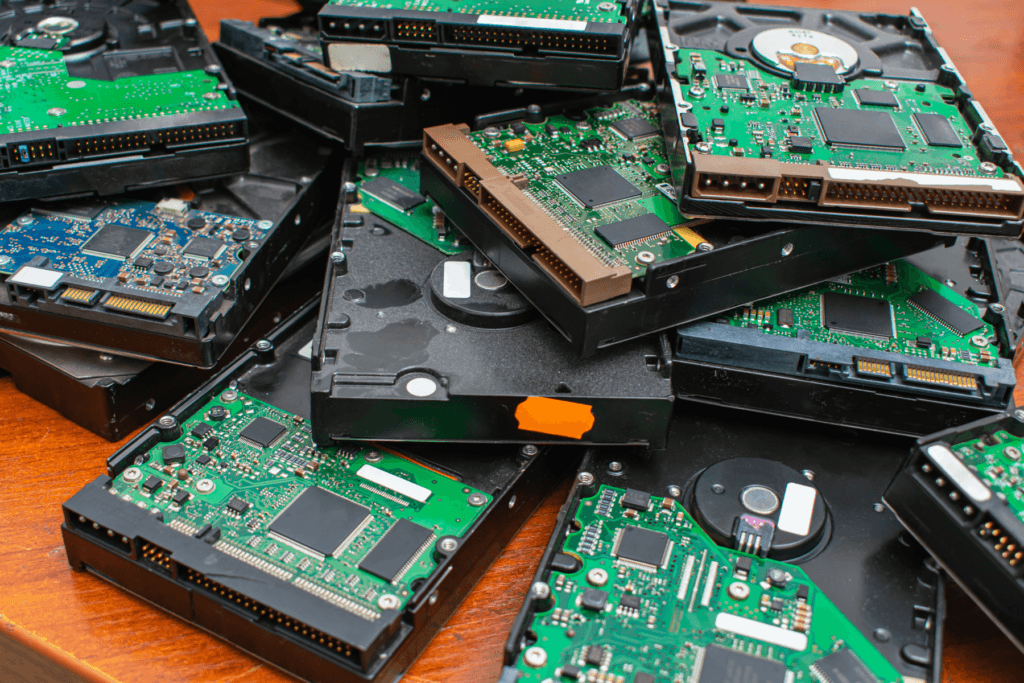 A photograph of old hard drives to convey what data hoarding can look like.