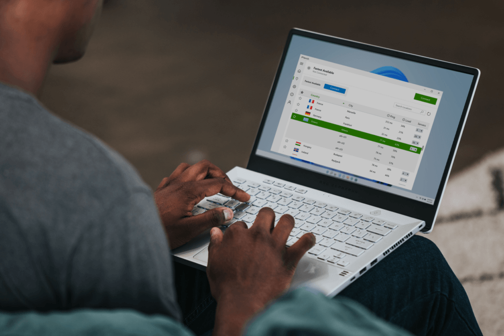 A person using a Windows computer is using silverbackvpn, decorative for free vpn for PCs