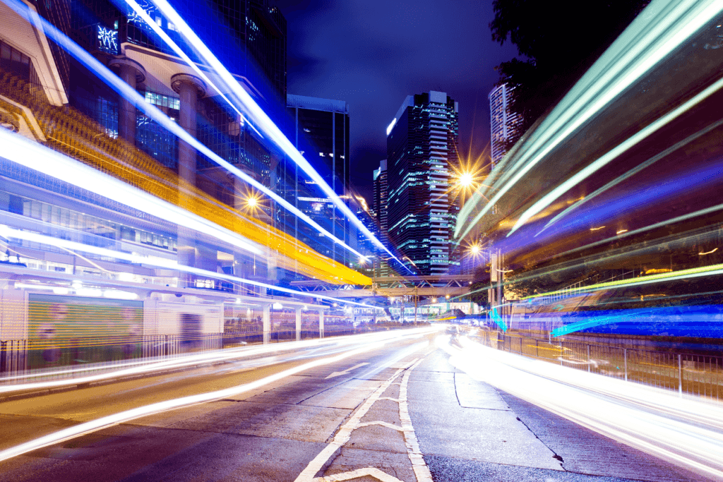 A light trail tunnel diverges and splits, decorative image to visualize split tunnel VPN traffic