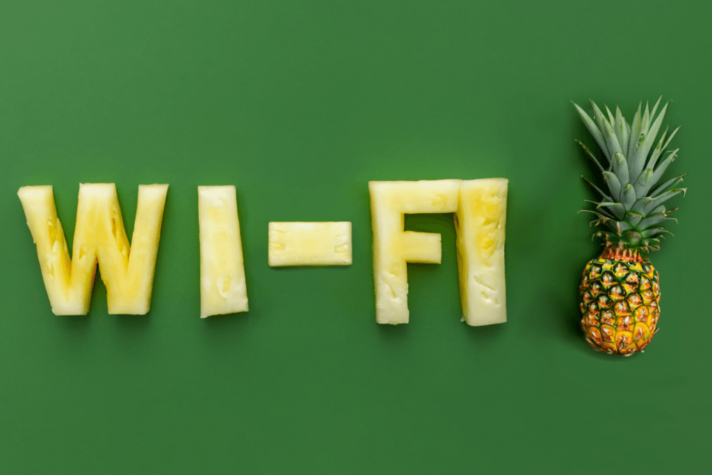 the word "Wi-Fi" spelled out using pieces of pineapple to visualize Wi-Fi pineapple attacks