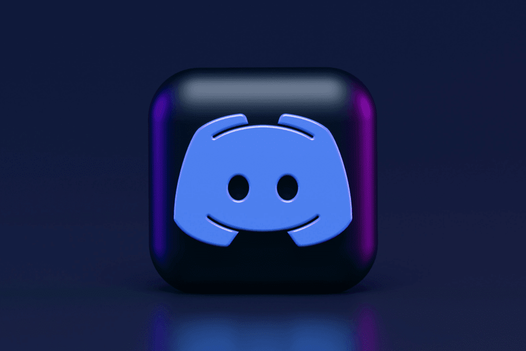 The Discord logo is seen in dark lighting to pose the question: Is Discord safe?
