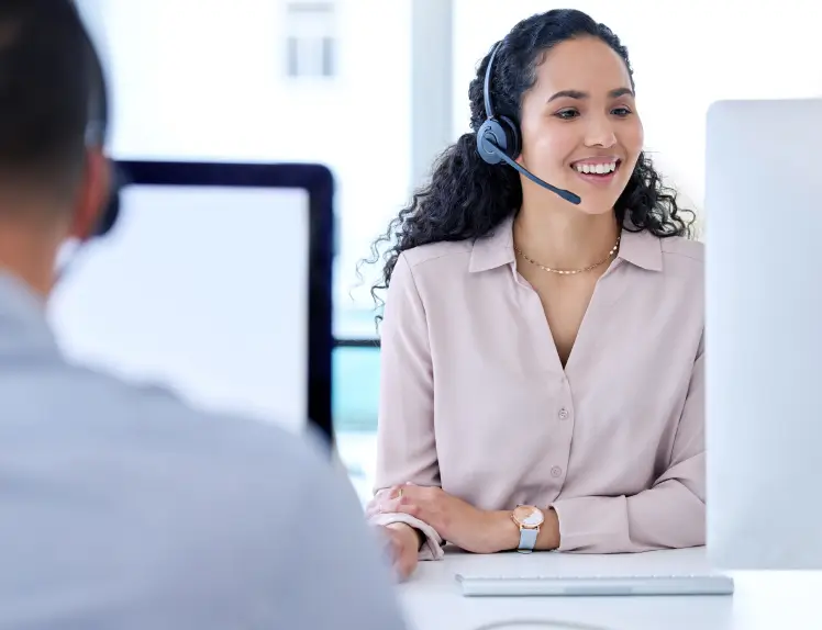 Femal support worker providing customer service