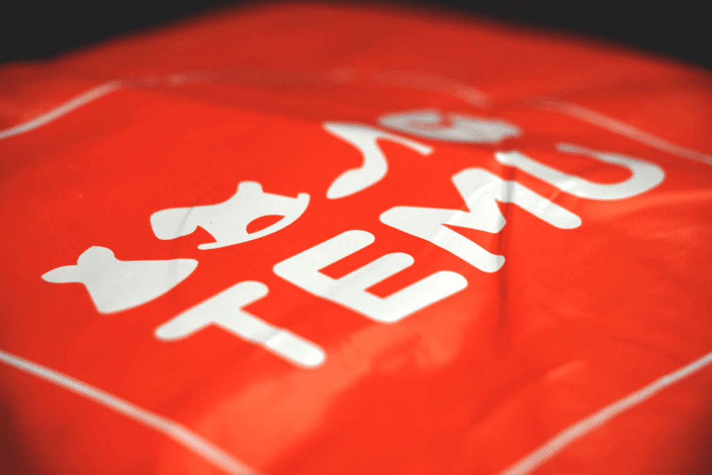 An image of the Temu logo on packaging, decorative for article answering the question Is Temu Legit?