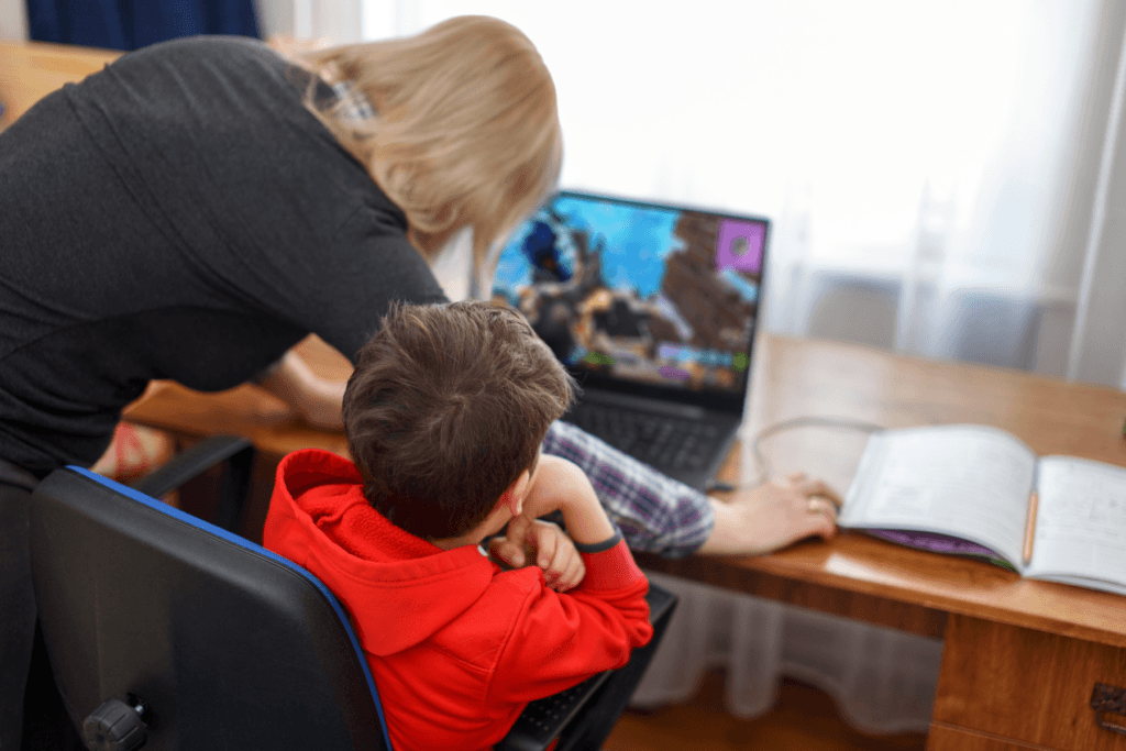 parent overseeing child playing roblox