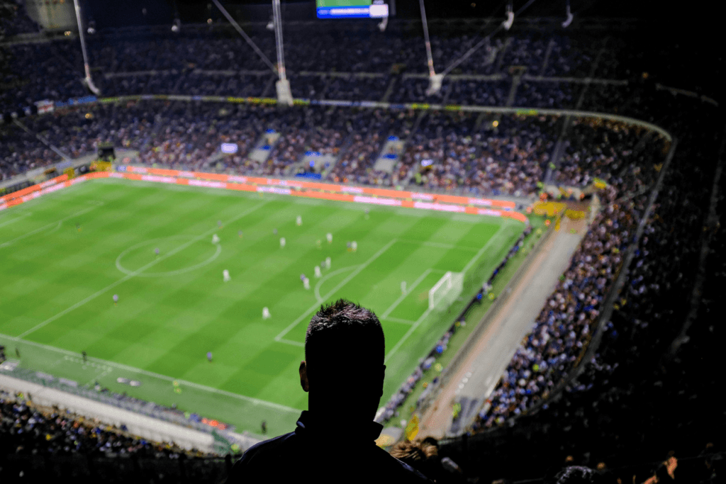 Man watching Serie A match at the San Siro