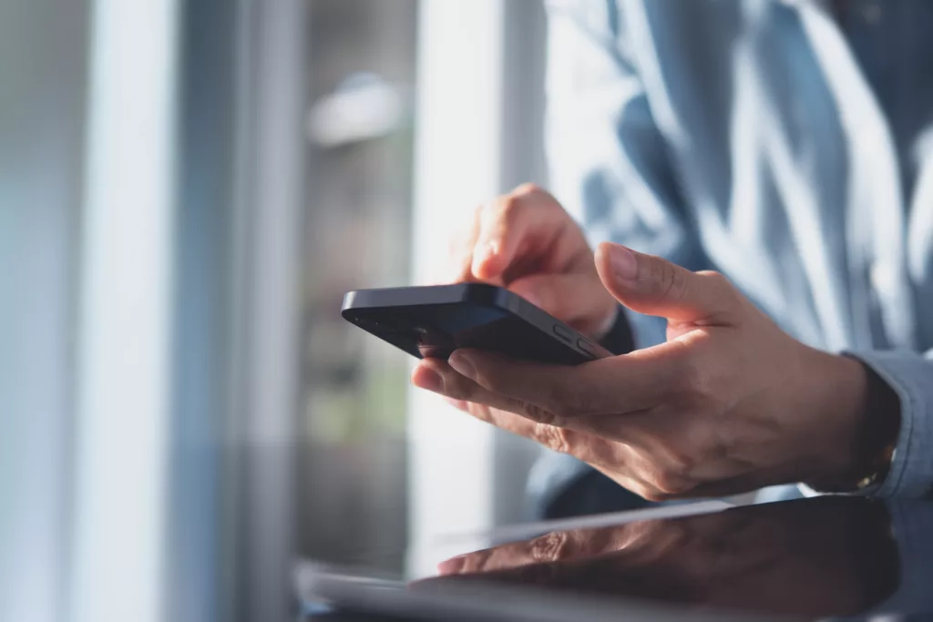 chrome privacy settings man using mobile phone