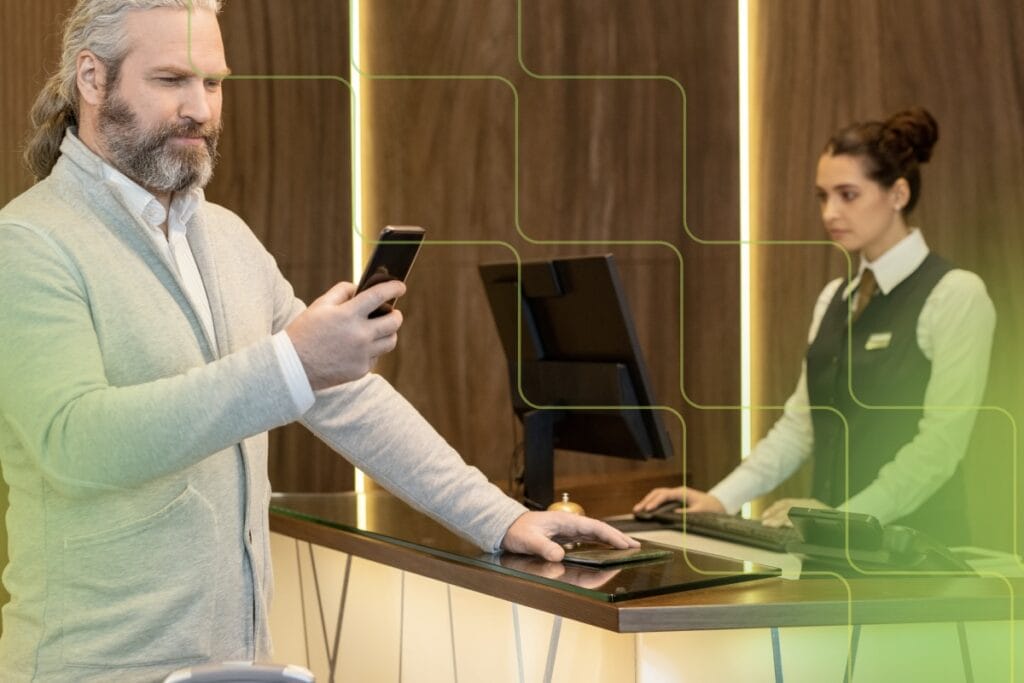 person using phone in hotel lobby, safe public wifi