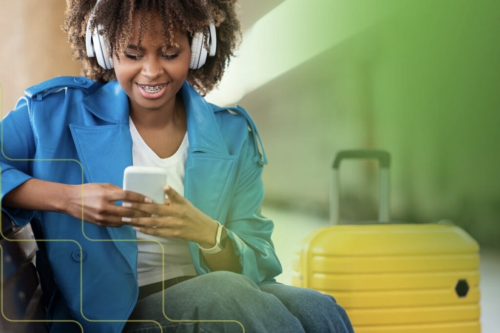 woman wearing headphones while traveling