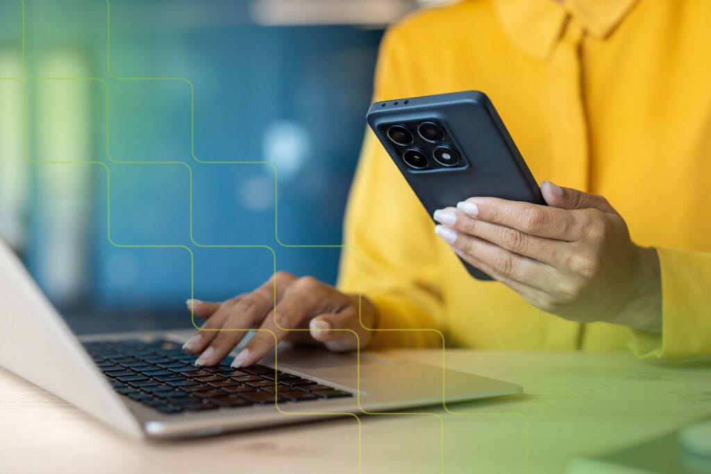 person using phone and computer, is vpn safe