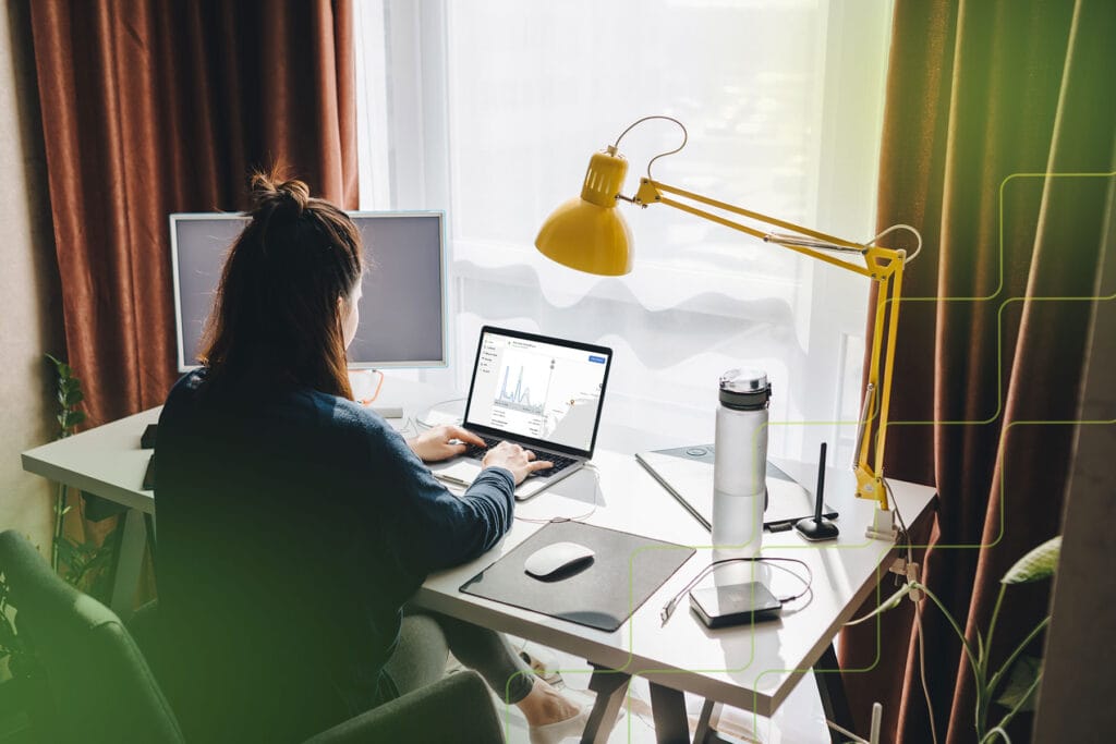woman working from home at her desk using silverbackvpn, most secure VPN
